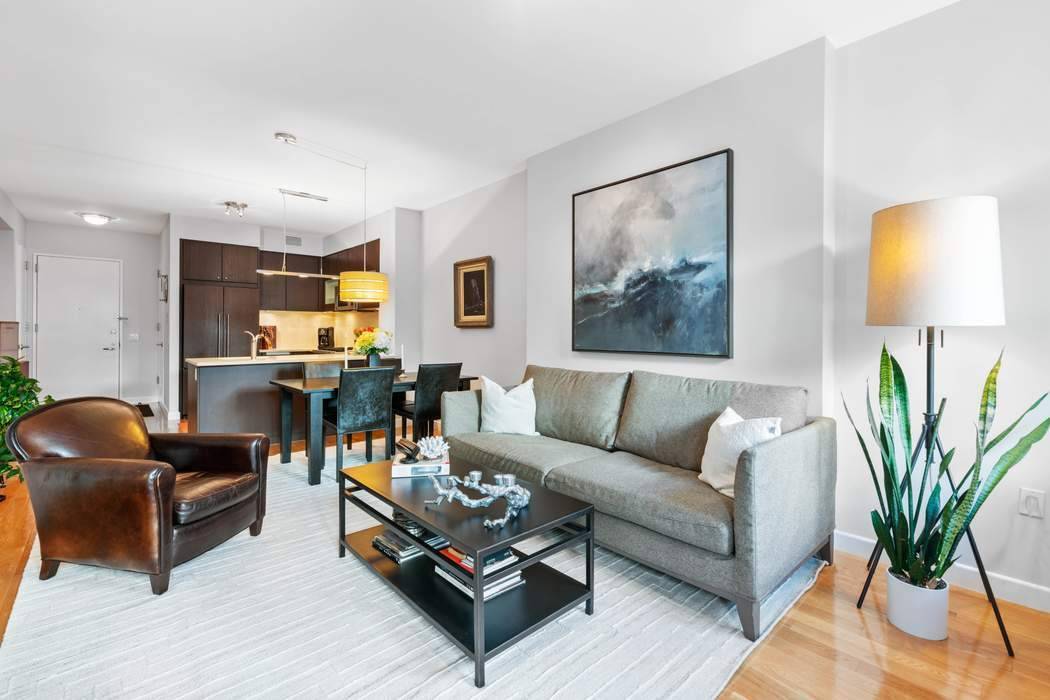 454 West 54th Street, 2L is a bright and welcoming one bedroom plus oversized home office with two full bathrooms.