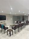 Dining space featuring recessed lighting