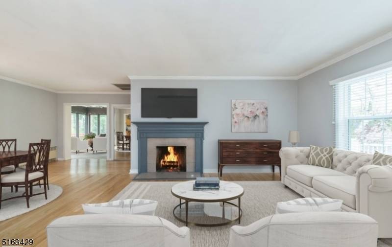 Attractive Brick Ranch on Park like lot in desirable Mountain Lakes.