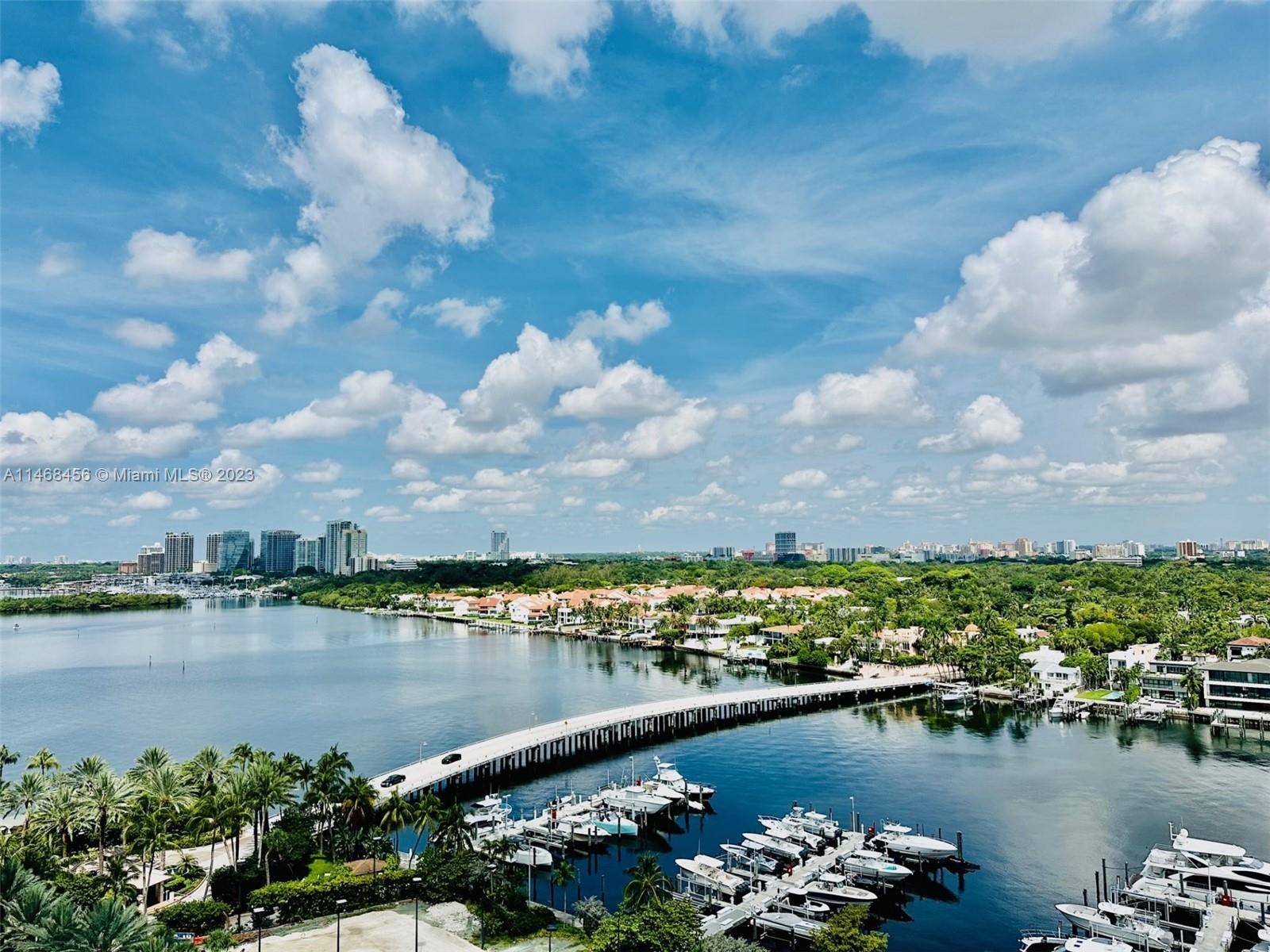 AMAZING VIEWS FROM THIS HIGH FLOOR UNIT FOR RENT AT GROVE ISLE RESIDENCE !