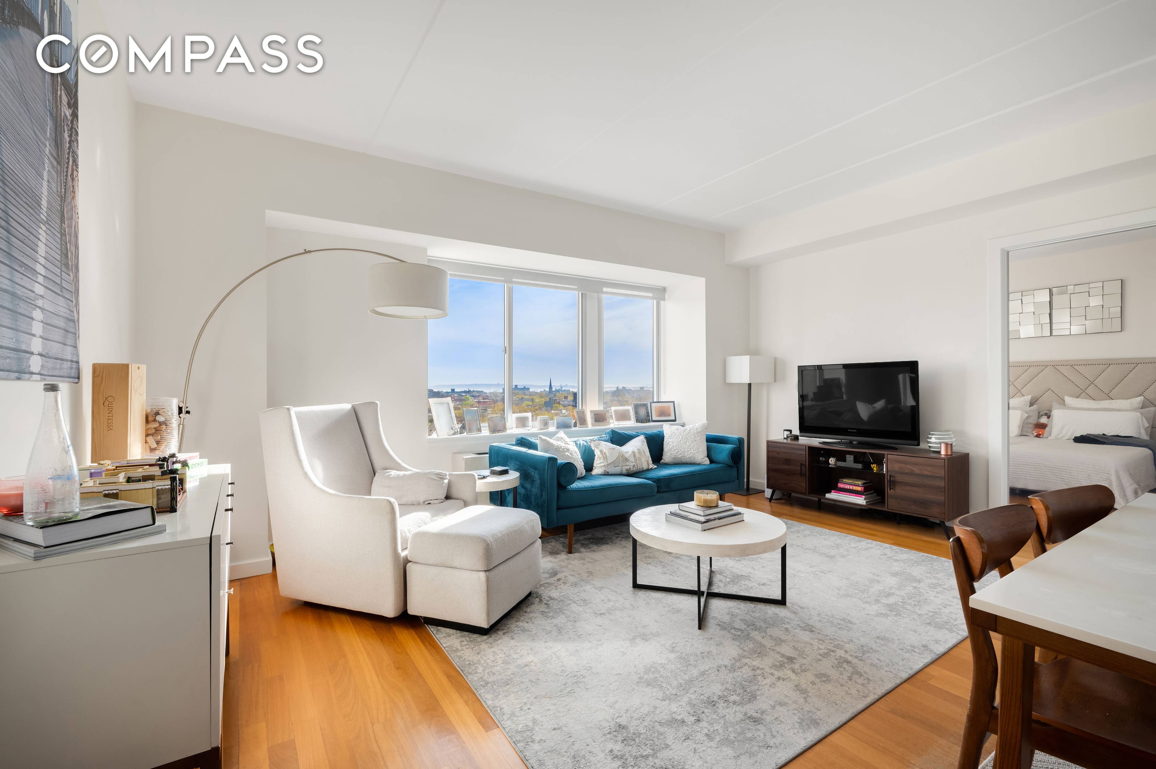 Experience breathtaking views of brownstone Brooklyn and the Verrazano Bridge from this stunning, high floor corner two bedroom two bathroom condo.