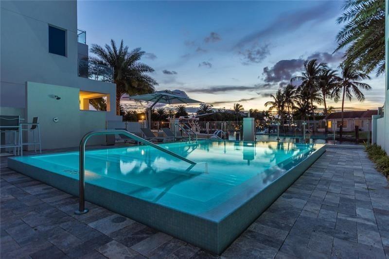 A remarkable luxury townhome rental that redefines upscale living in the heart of Lauderdale By The Sea. This beautifully designed 3,027 sq. ft reside