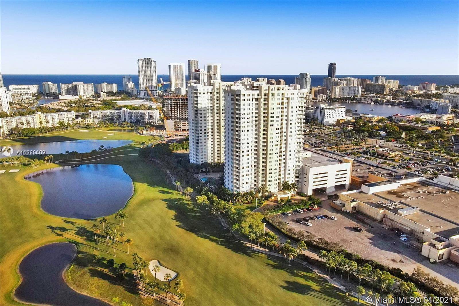 TURN KEY apt with breathtaking Golf Course, Lake, Ocean Pool Views from Wrap Around Balcony.