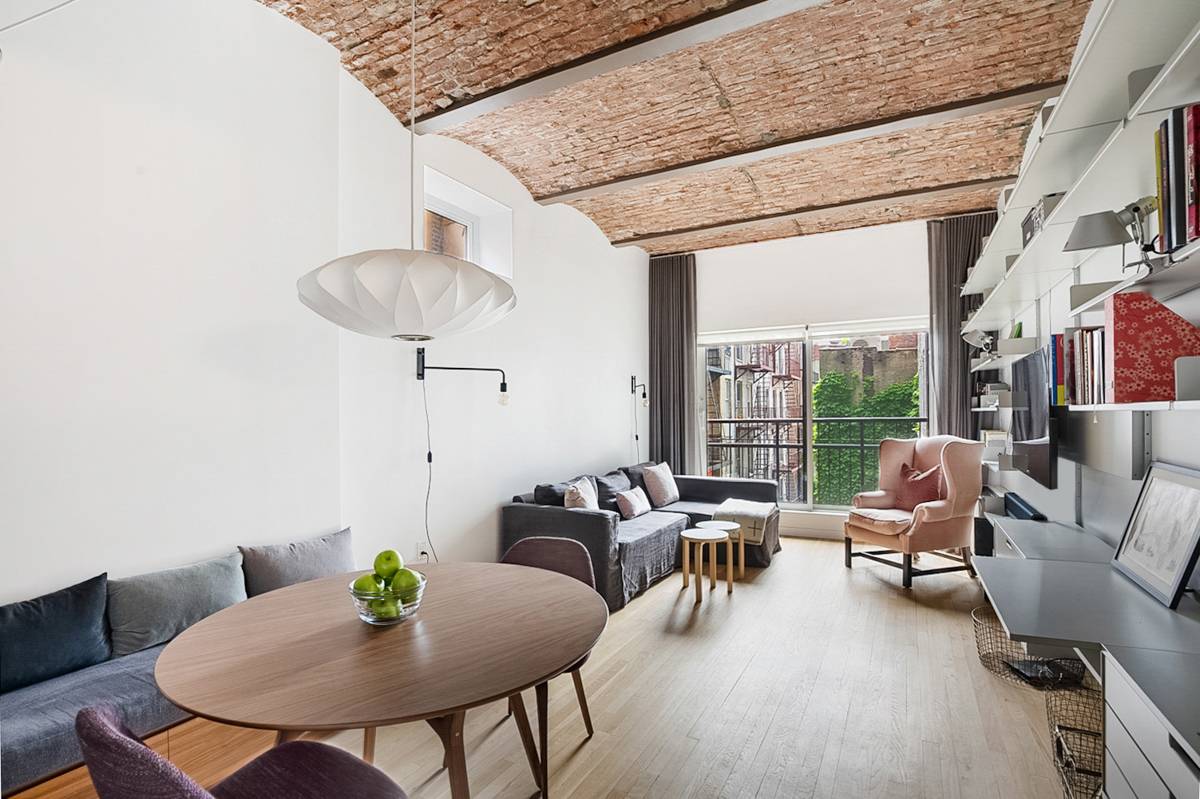 This unit is the definition of Greenwich Village style A 1 bedroom featuring 10 6' barrel vaulted ceilings comprised of exposed brick in one of the top West Village locations.