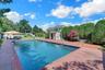 The best of outdoor living! Make lasting memories with family and friends in this resort-style backyard