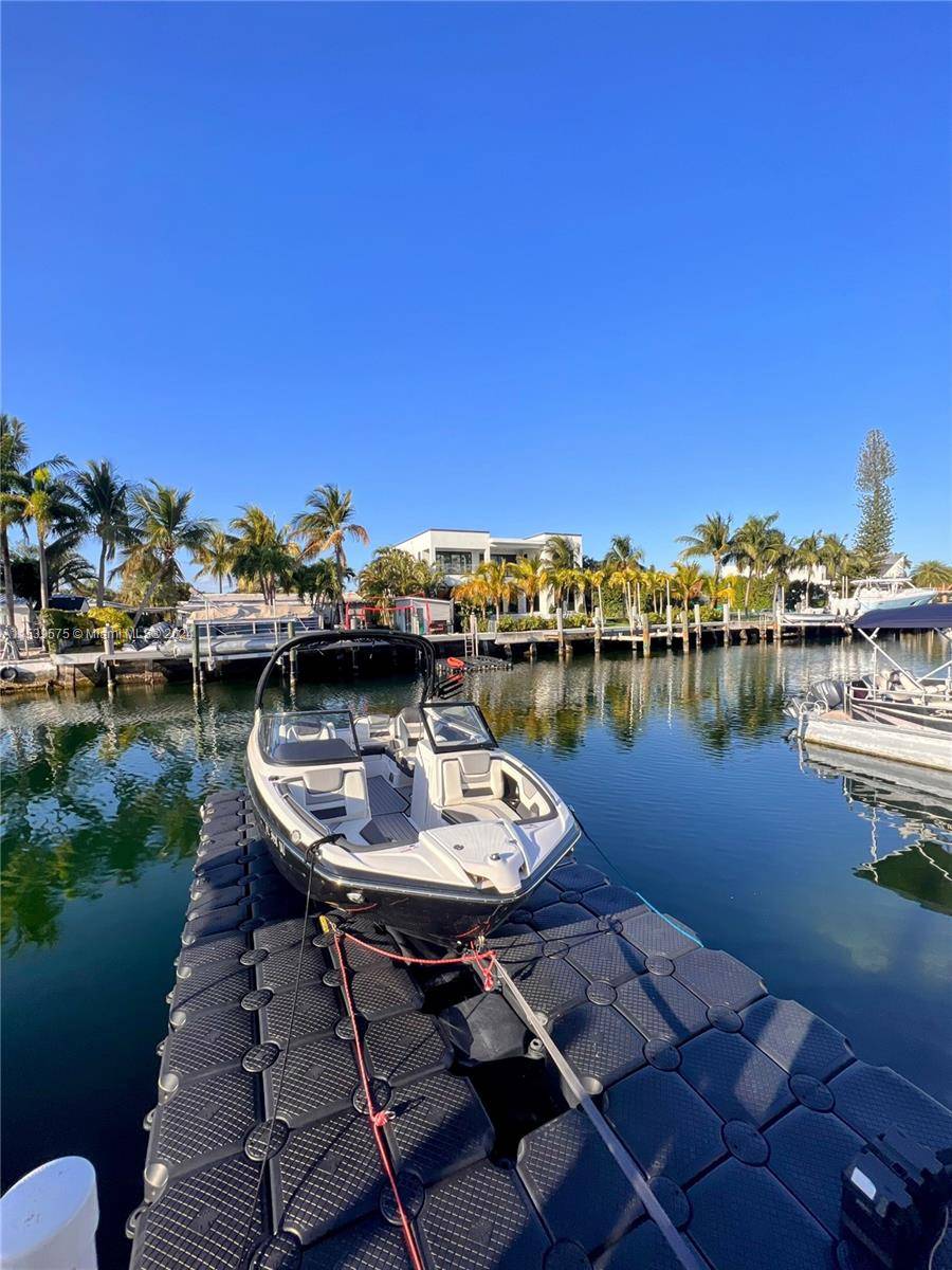 Furnished Waterfront townhome with private boat dock.