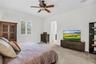 Spacious primary suite with en suite bathroom and walk-in closet