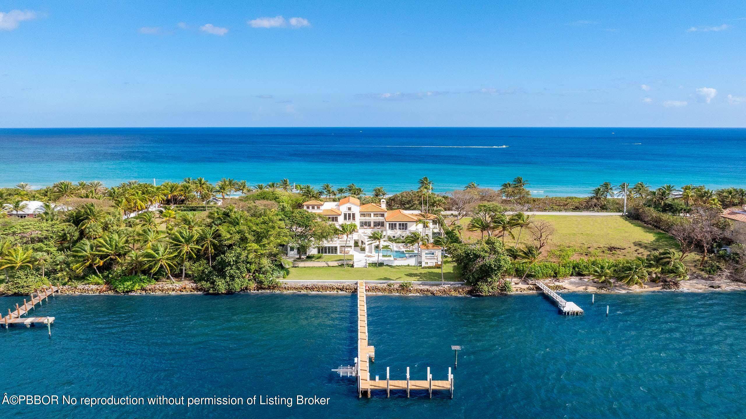 Recently updated, this stunning Ocean to Intracoastal Manalapan compound with beach house is situated on almost two acres with 150 feet of direct ocean and Intracoastal Waterway frontage.