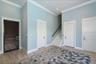 Ground level foyer, garage entrance and elevator door