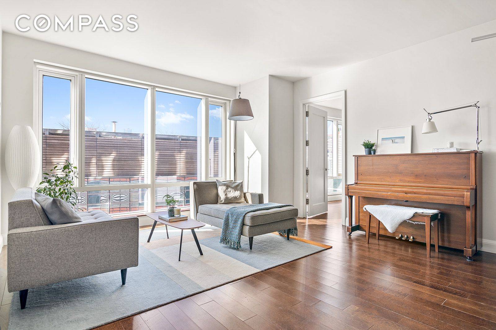 Welcome home to residence 12D, located in the premiere Battery Park condominium, The Visionaire.