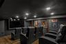 Home theater room featuring recessed lighting and wood finished floors