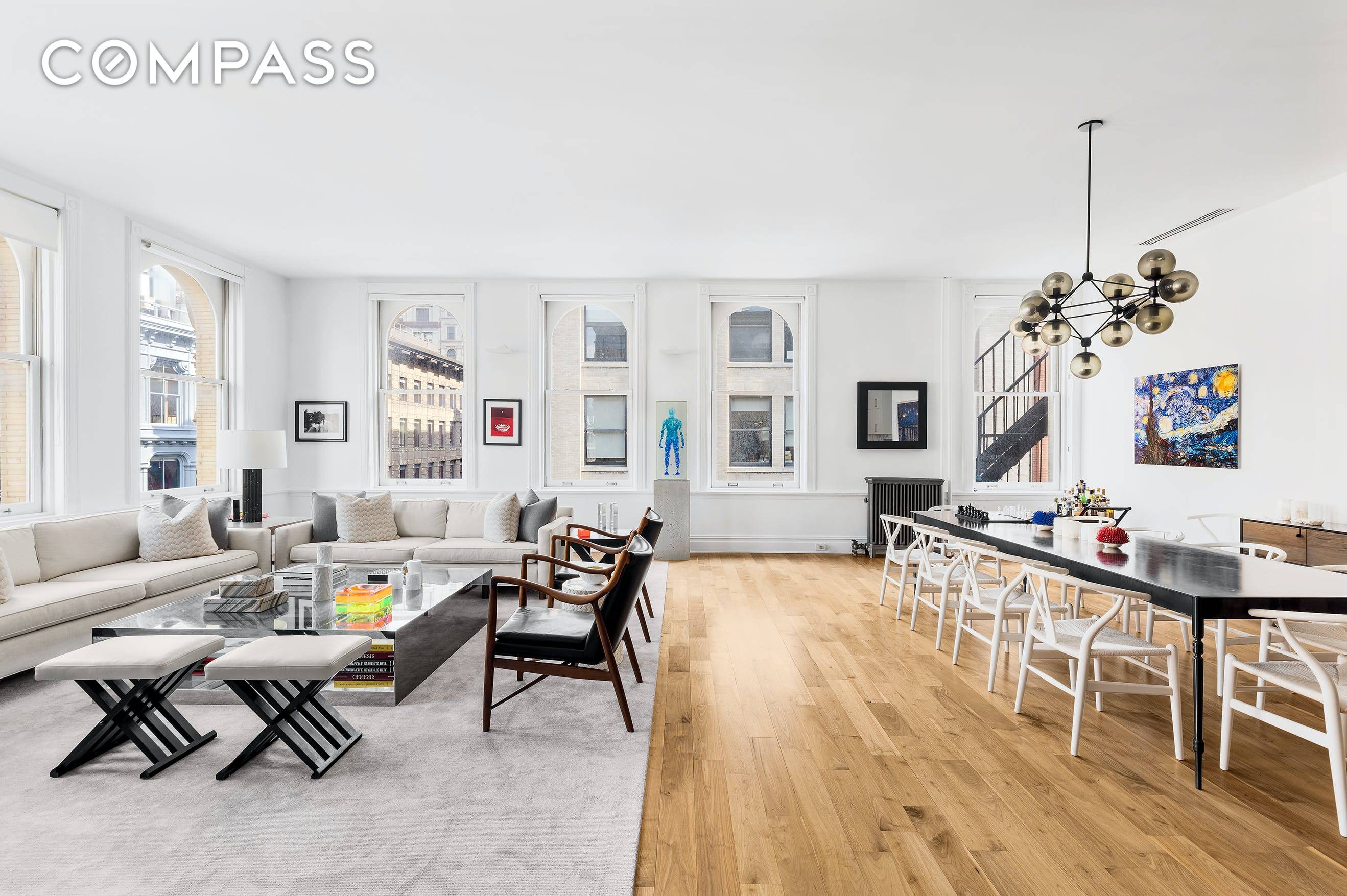 Situated at the intersection of Spring Mercer in the heart of Soho, 5N is a dramatic corner loft featuring 11 foot ceilings and 12 arched windows facing east and north.