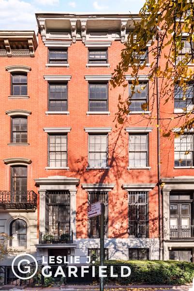 This incredible and enormous Greek Revival style townhome and is ready for your architect to transform it into a splendid and luxurious mansion.