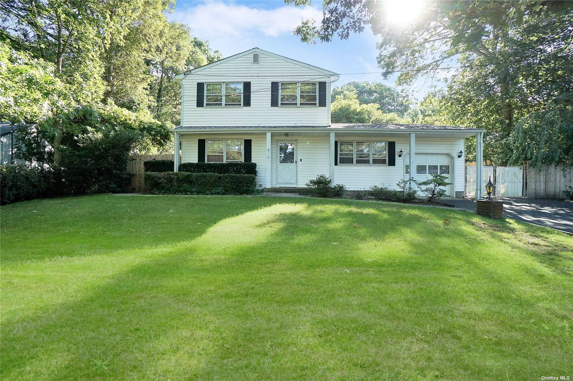 Great opportunity for Nice Size Colonial with Large Private Yard Wood Floors