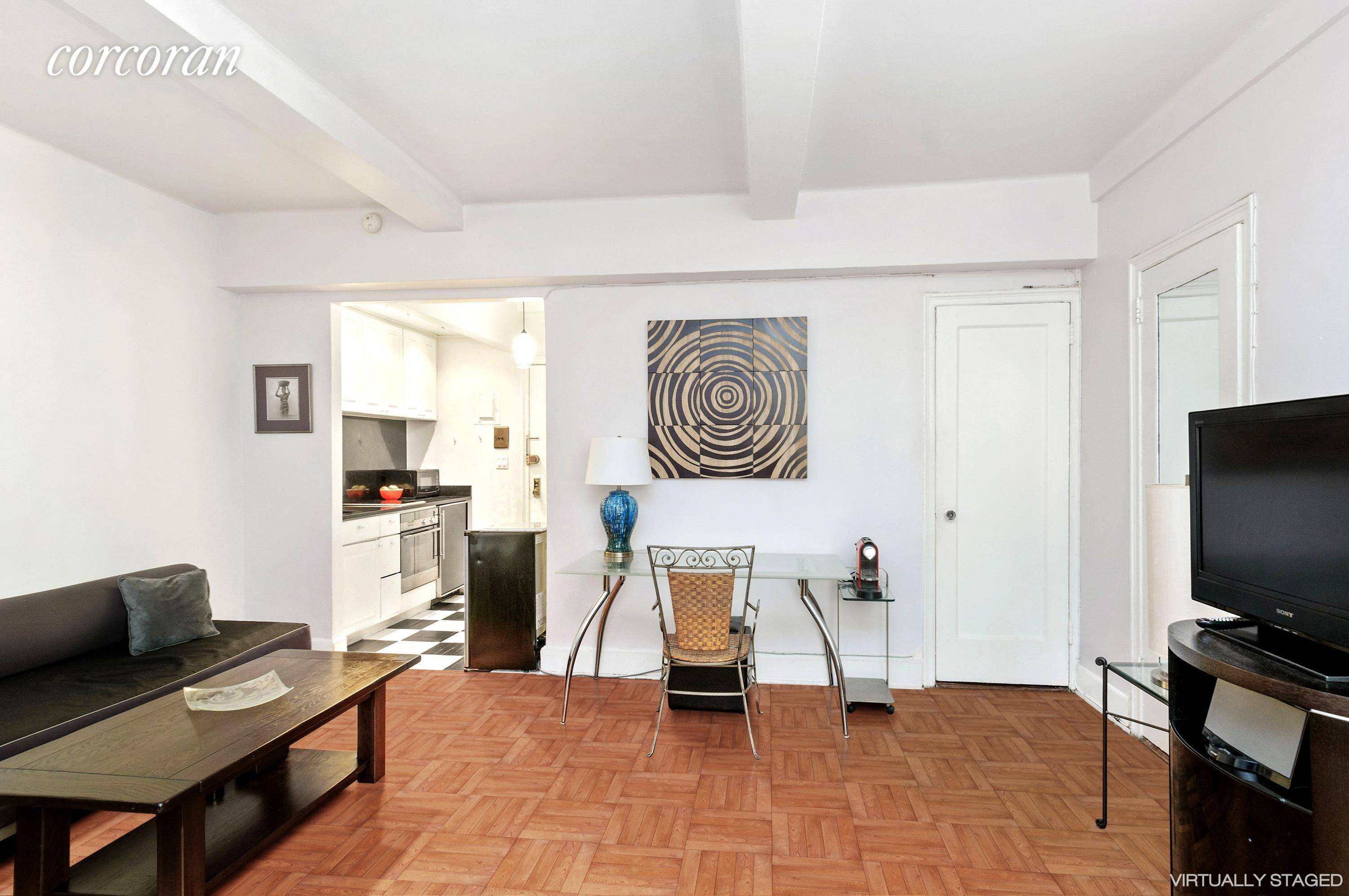 Expansive 2 room alcove studio located at 24 Fifth Avenue apt 822.