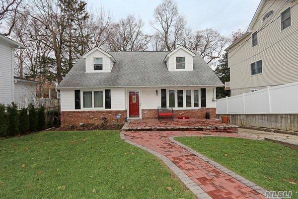 Beautifully well maintained 5 Bed 3 Bath cape close to Huntington Village and LIRR.