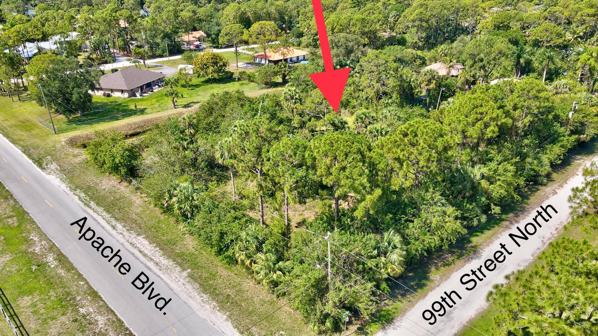 GORGEOUS 1. 54 acre vacant lot in the Acreage on the Southwest corner of Apache Blvd and 99th St.