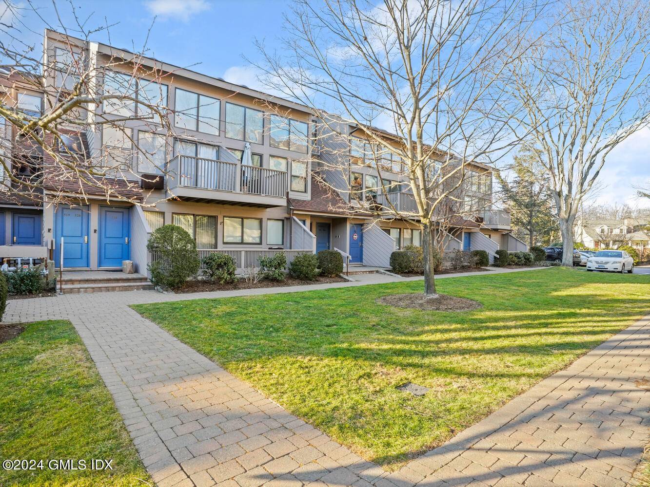 Enjoy this well kept, sun filled two bedroom Old Greenwich condo in The Common !