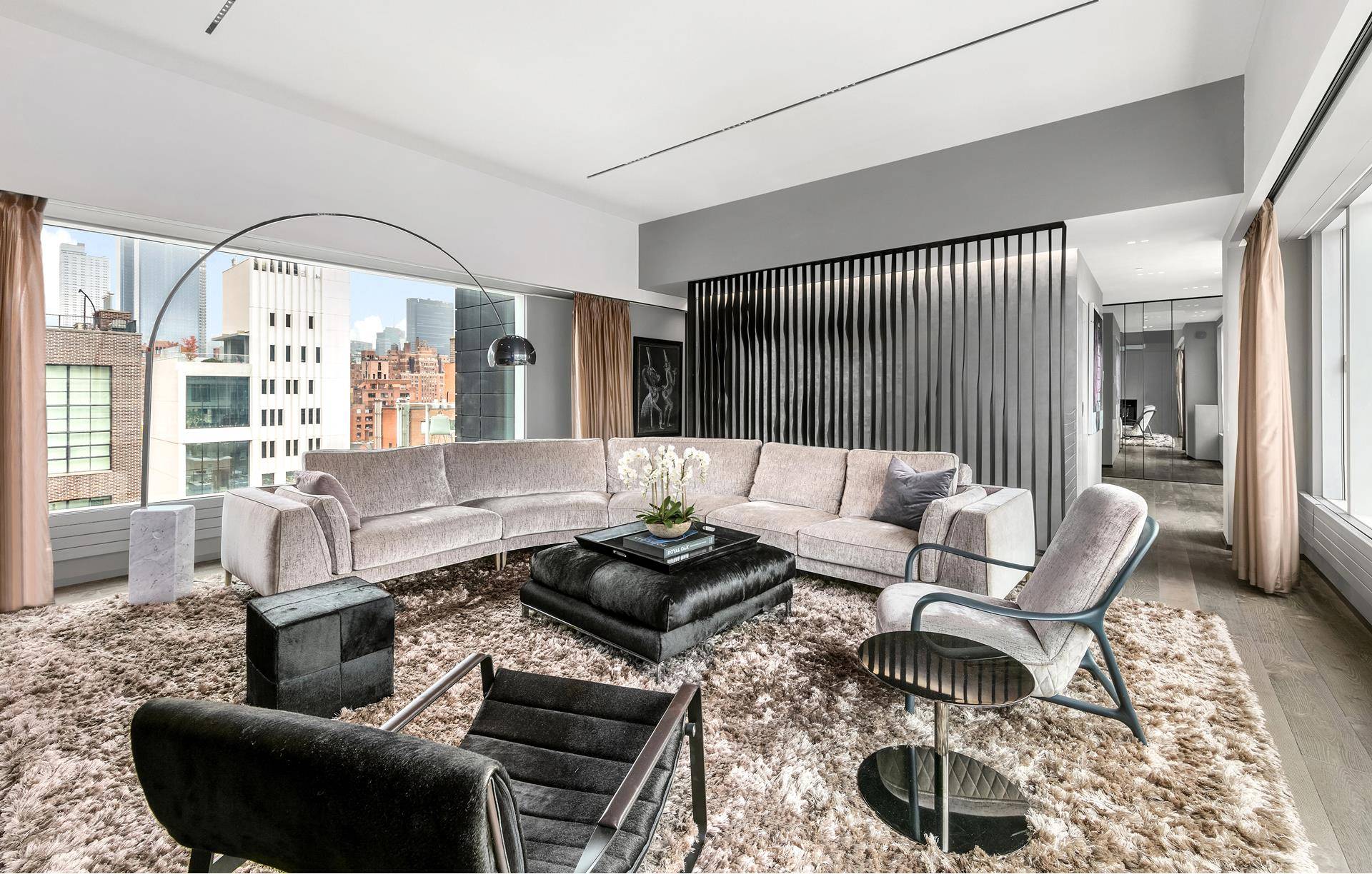 This exceptional and ultra luxurious triplex penthouse is located in the heart of West Chelsea, offering sweeping 360 degree views of the Highline Park, Hudson River and most dramatic vistas ...