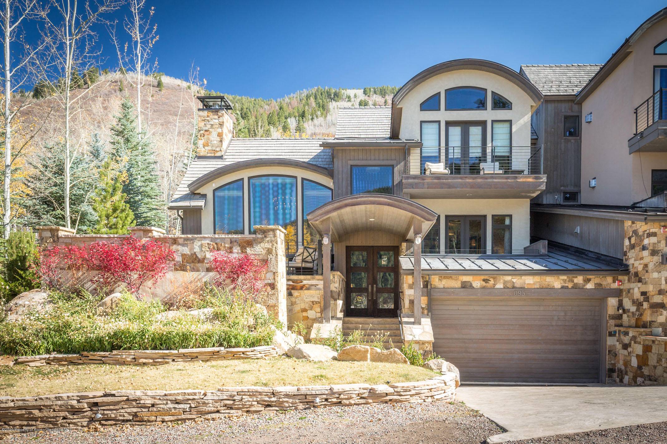 Beautiful mountain contemporary East Aspen property with two masters, gorgeous views, two living rooms and an open floor plan.