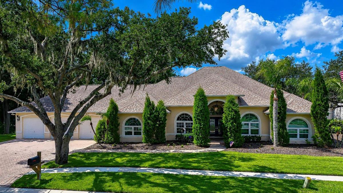 Stunning custom estate located in the exclusive Emerald Creek community.