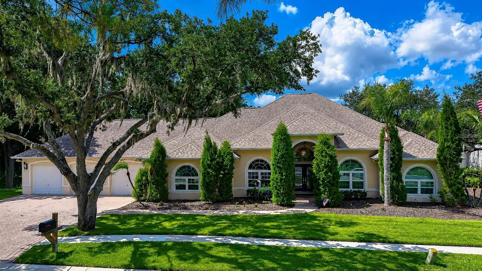 Stunning custom estate located in the exclusive Emerald Creek community.