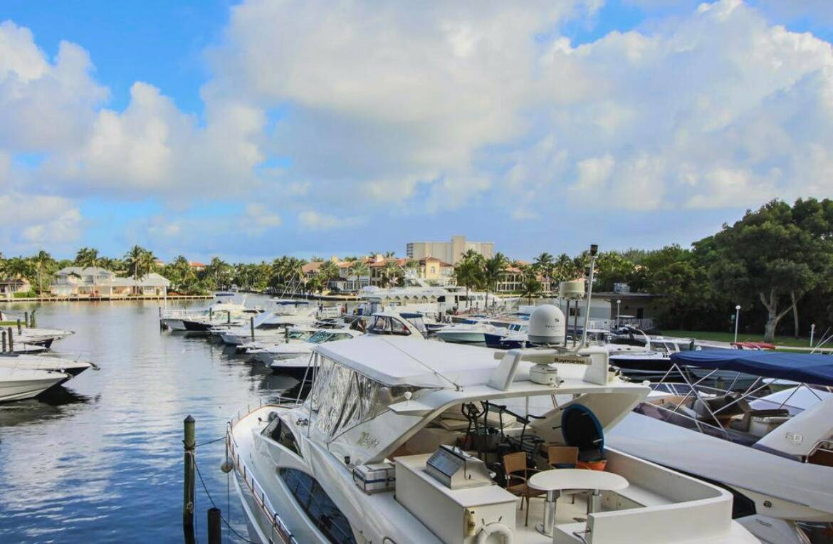 Stunning 2 story spacious waterfront townhome available for short or long term rental in Delray Harbor Club, featuring 2 beds 2.