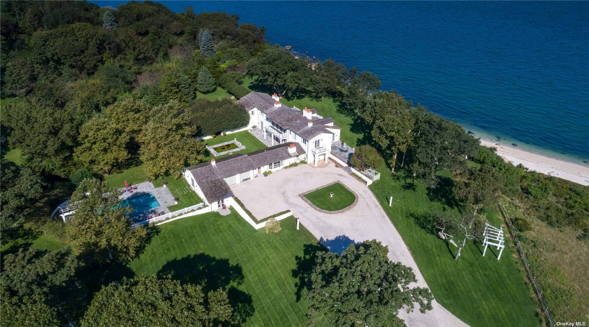 Down a private driveway with breathtaking views of the sea, privacy and luxury collide !