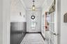 Foyer with Office French doors on right of view