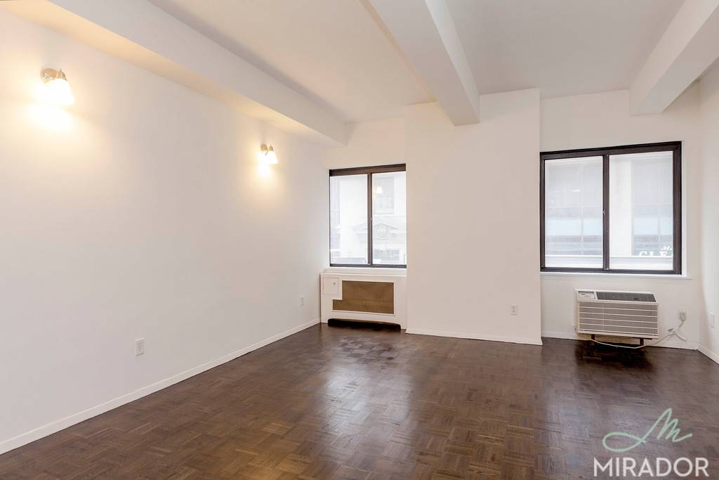 Over sized loft style studio in Madison Avenue elevator building with package room, elevator, laundry amp ; free WiFi.