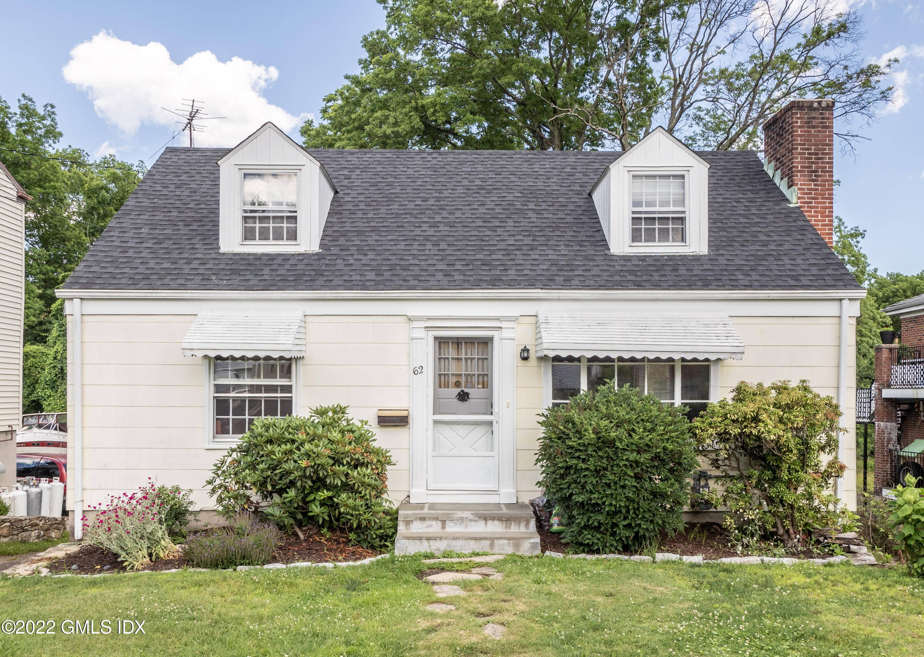 A classic Cape Cod style home just a stone's throw away from the beach.