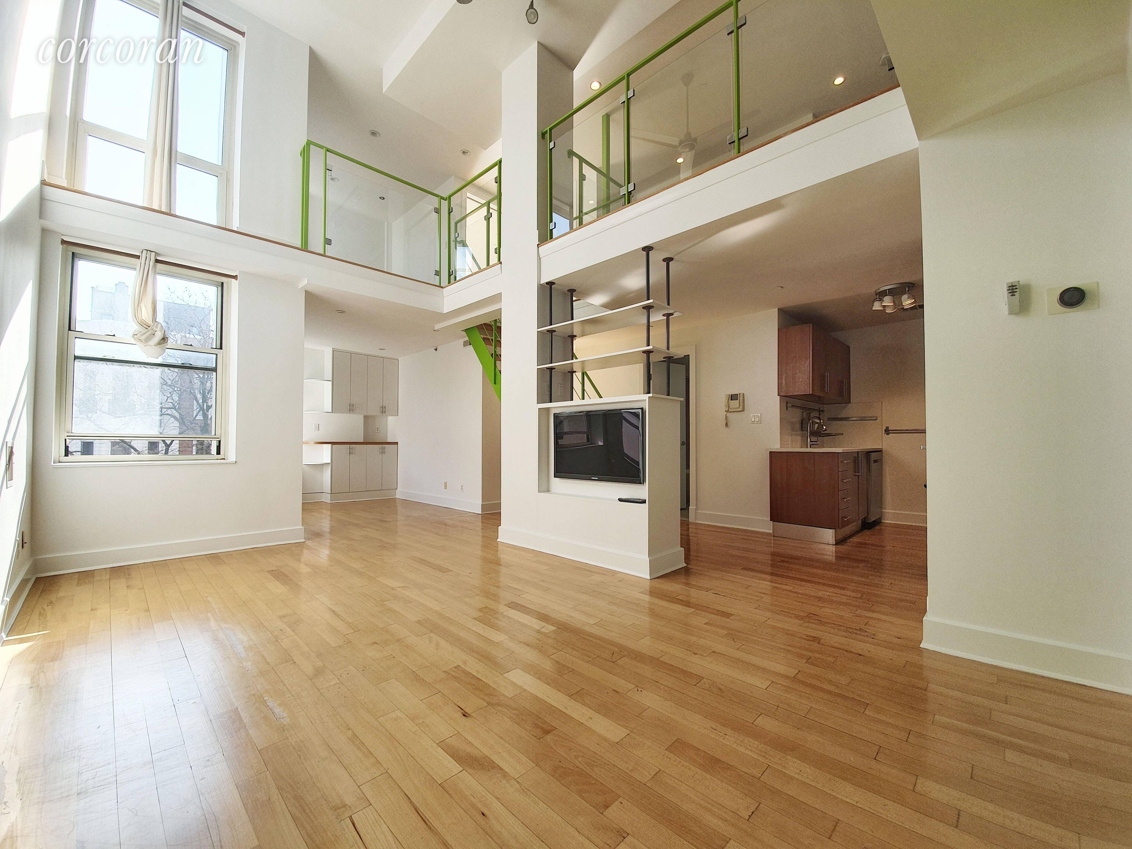 Gorgeous loft style condo nested in one of Williamsburg's most charming tree lined streets.