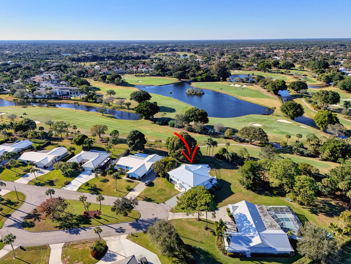 Home Backs up to Ballenisles Golf Course