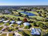 Home Backs up to Ballenisles Golf Course