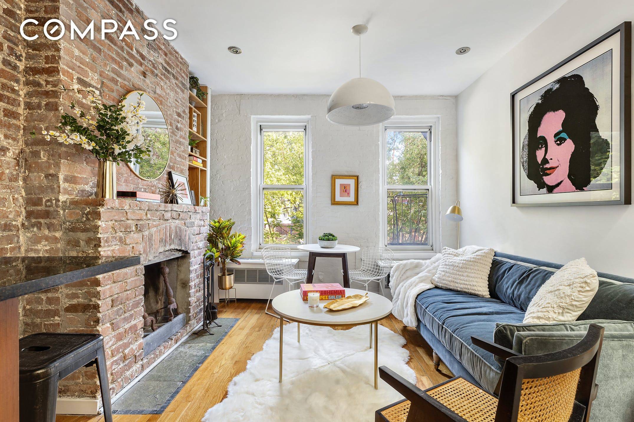 DREAM DUPLEX. A unique two bedroom home with a wood burning fireplace and a private roof deck is the essence of the West Village.