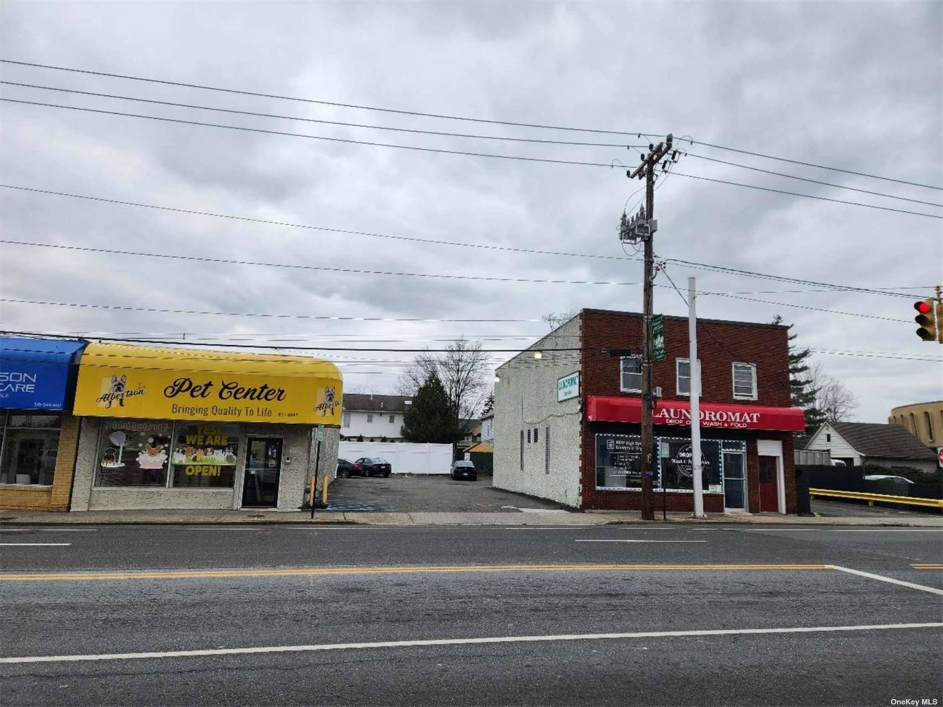 Long Island, Heart of Albertson, from LIE exit 36, Mixed use properties w three units of 3000 sf retail space ; 20 parking spaces on two adjacent lots of over ...