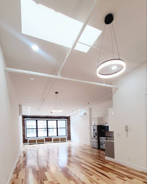 1700 sq. ft. one of a kind stunning true Loft with 12 foot ceilings in the heart of Flatiron district !