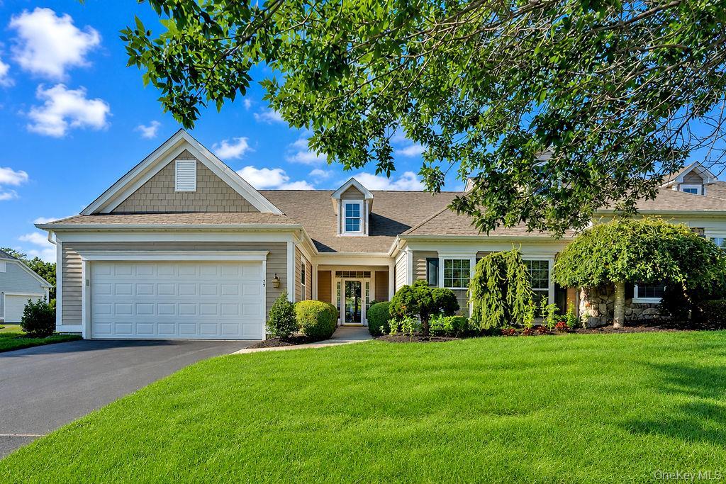 Welcoming front exterior with mature plantings