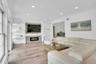 Stunning wall unit features gas fireplace.