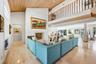 Living Room has elevated cedar ceilings