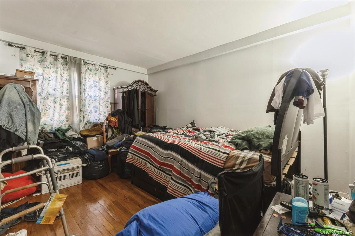 1st floor Bedroom with hardwood / wood-style floors