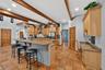 Gourmet Kitchen with Granite Countertops, Breakfast Bar and Study Desk
