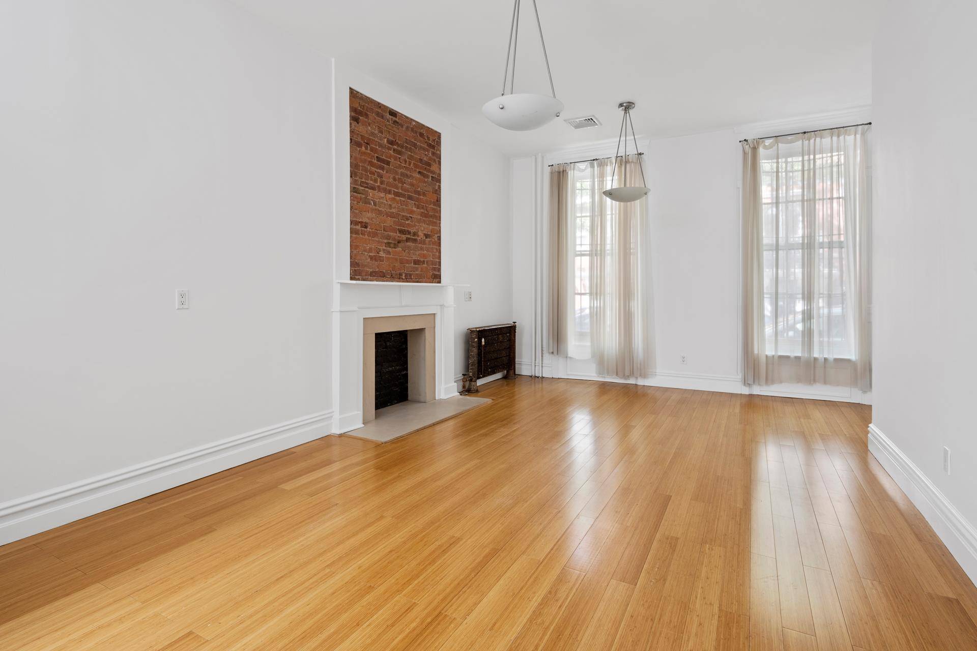 Residence 1F is a charming 1, 000 SF one bedroom one bathroom featuring hardwood floors throughout, renovated kitchen and bathroom, and oversized windows with northeastern and eastern exposures.