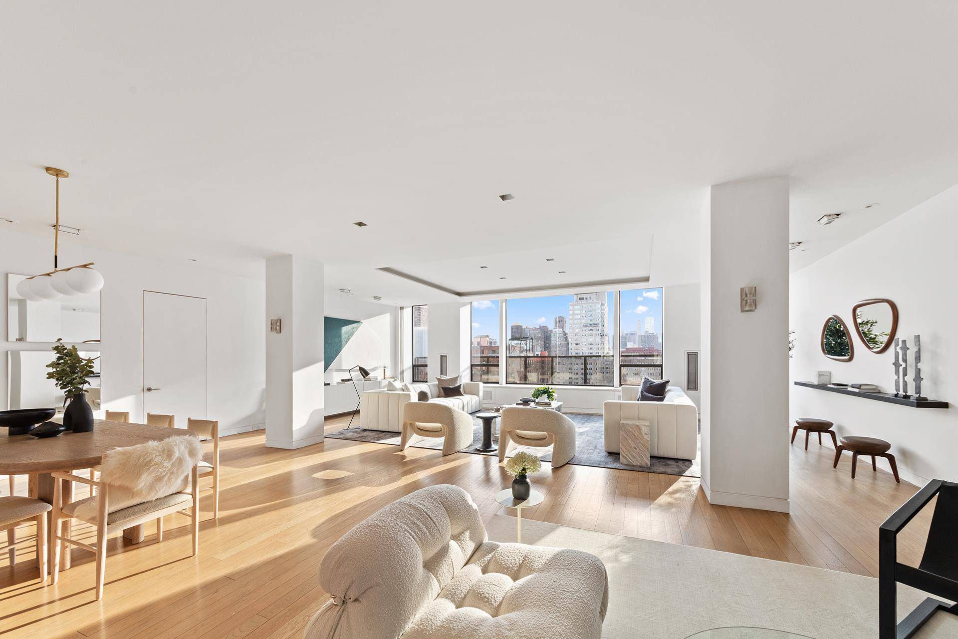 Only in a superb pre war condo loft building like 12 East 12th Street does one get nearly 6000' of beautifully configured and sun filled living space looking onto unobstructed ...