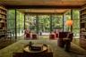 featuring expansive windows and wood ceiling