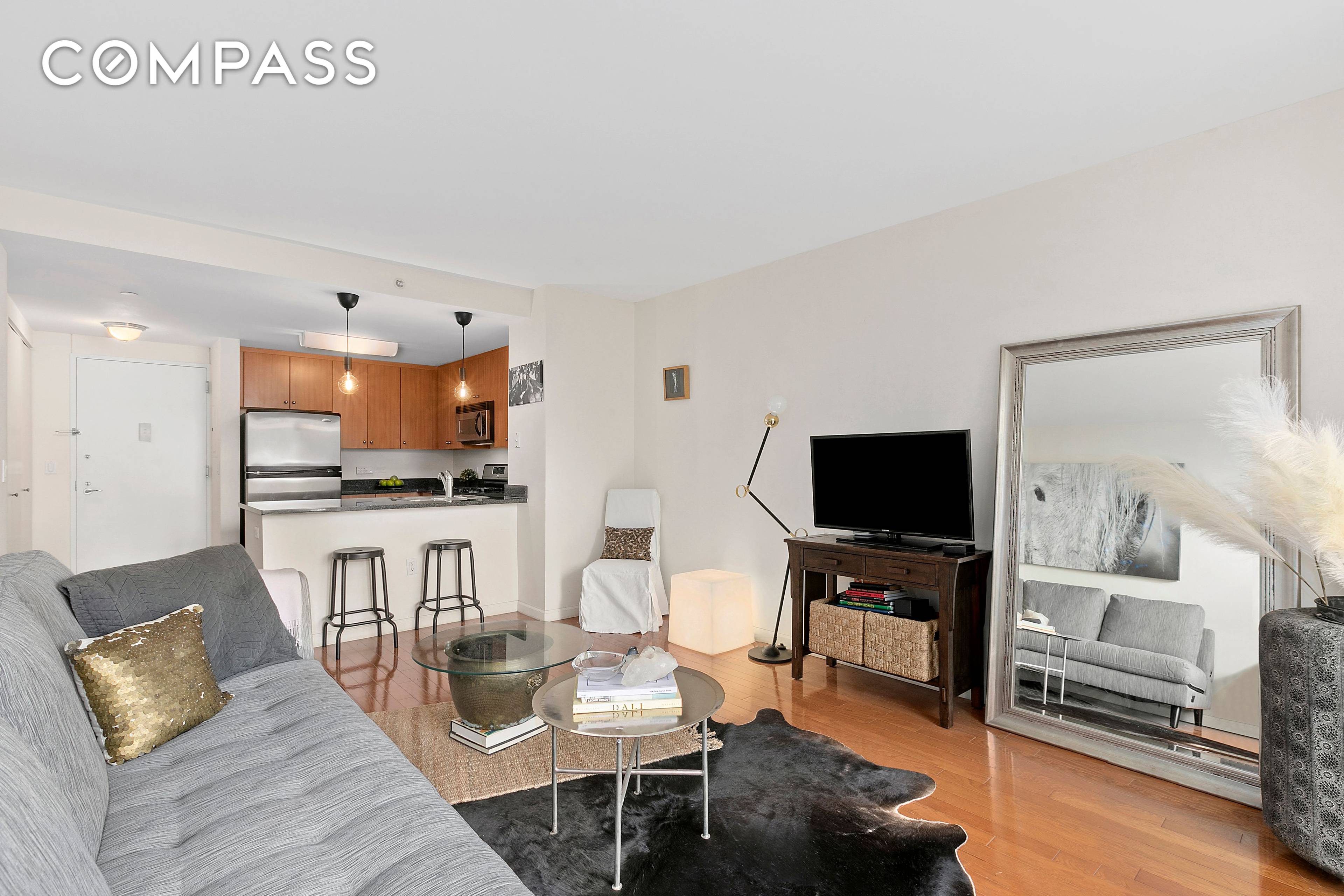 This unique North West facing 1 Bedroom home is featuring floor to ceiling windows, high end finishes, open modern kitchen with stainless steel appliances including a range, refrigerator, dishwasher, microwave, ...
