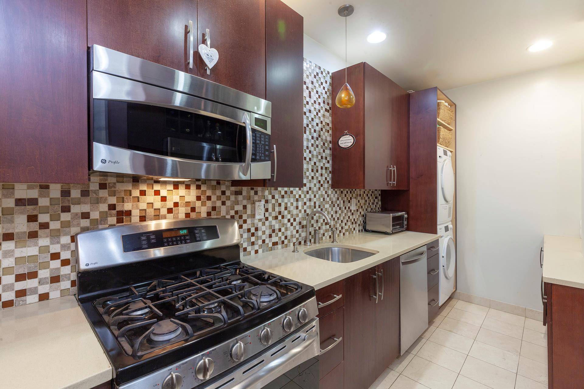 This beautiful 733 square foot condominium perfectly blends classic charm and modern convenience.