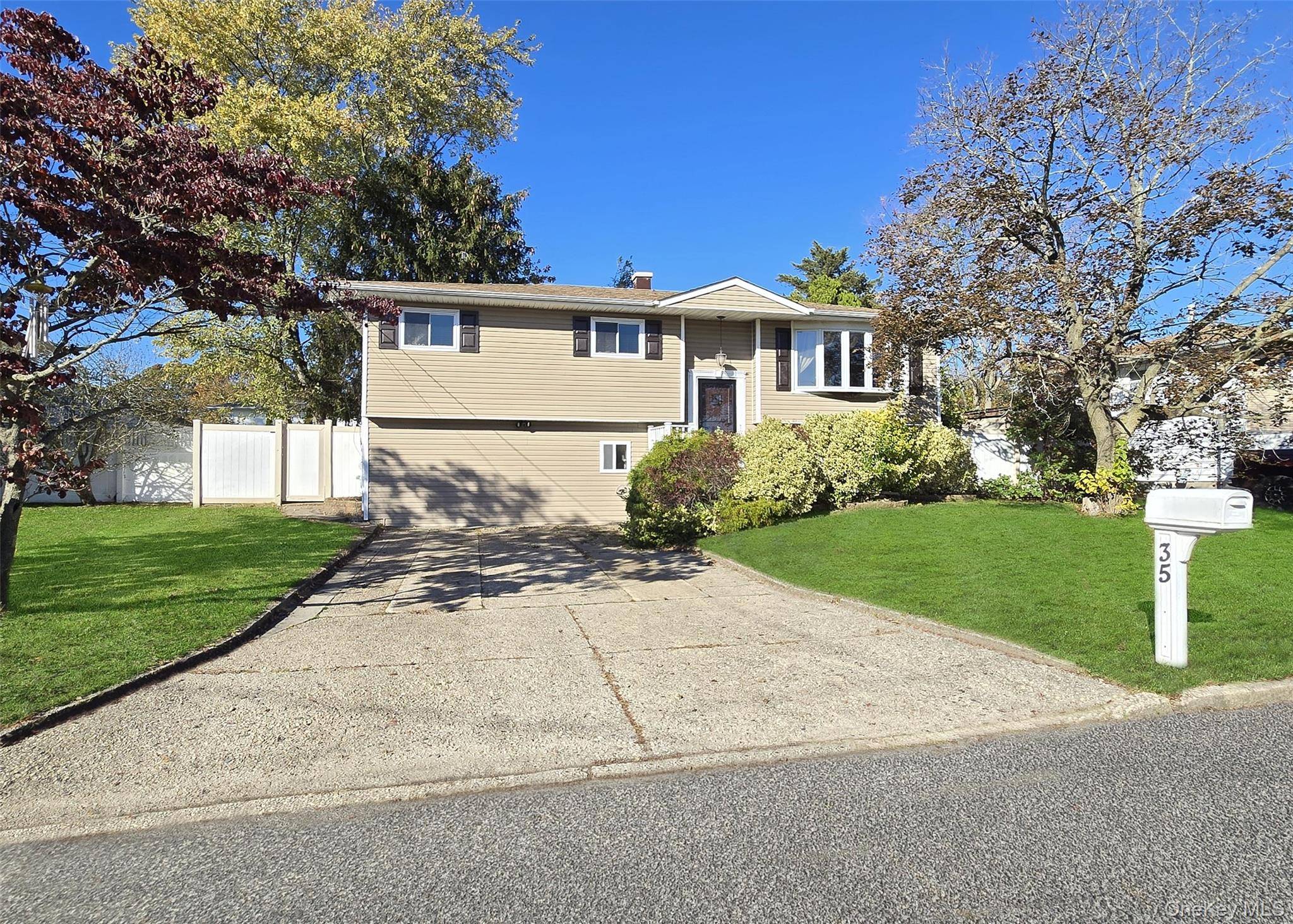 Welcome to 35 Van Buren, a spacious 4 Bedroom Hi Ranch with hardwood floors, updated kitchen 15 yrs.