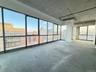 Unfurnished sunroom with a view of city