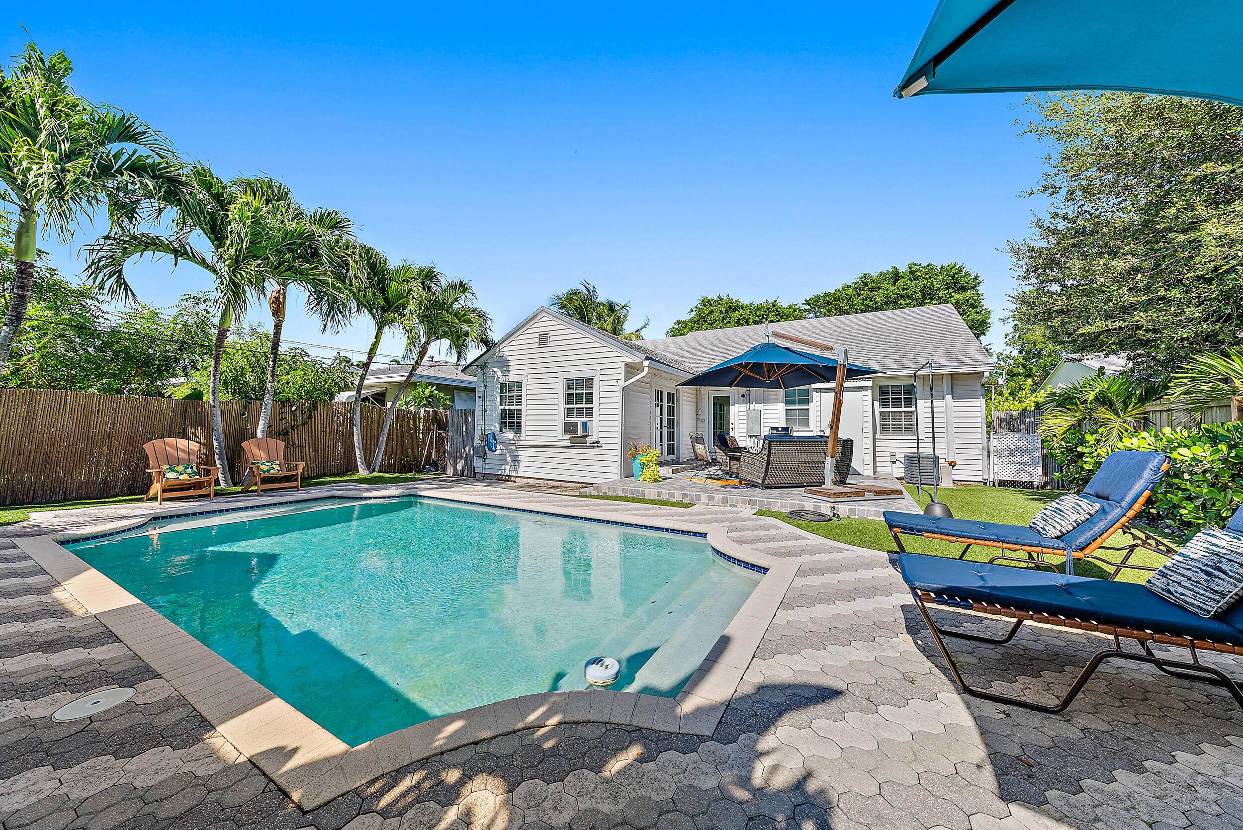 This three bedroom, two bathroom home with an ultra private pool and lush backyard.